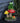 Solar Frog Sitting On Top of Mushroom Statue