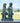Girl and Boy Sitting on Bench with Puppy Statue